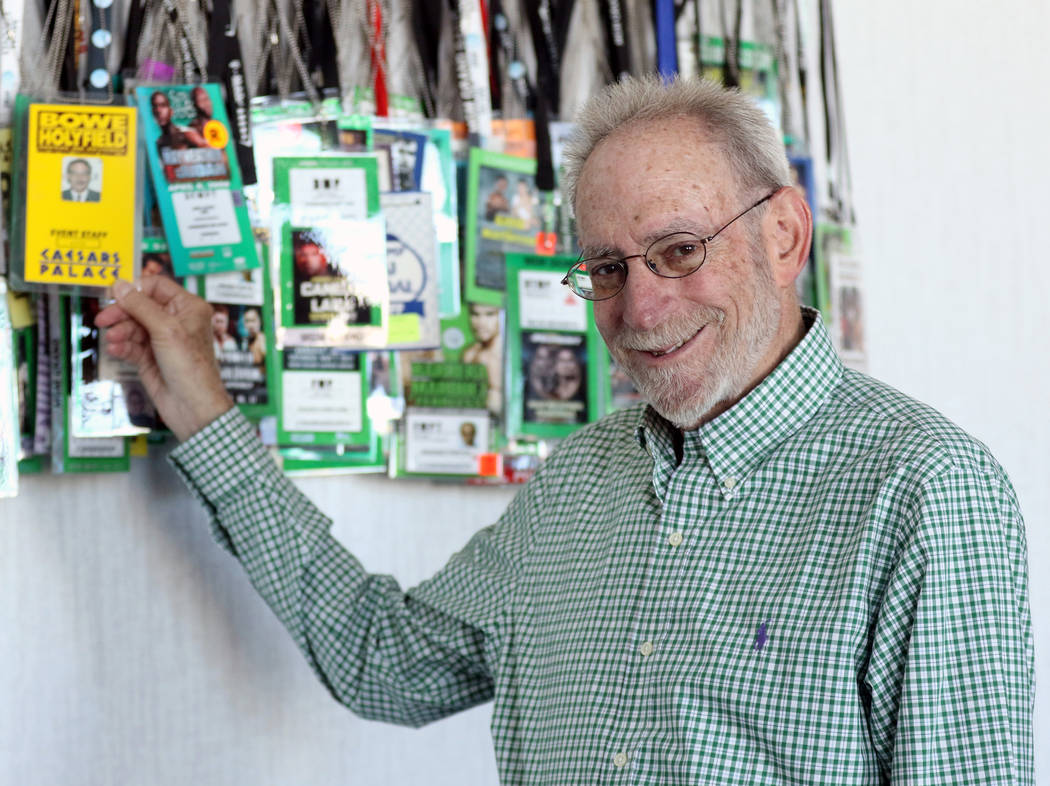 Marc Ratner, former executive director of the Nevada Athletic Commission, holds up his credential for the Riddick Bowe-Evander Holyfield rematch on Nov. 6, 1993, during an interview in his office ...