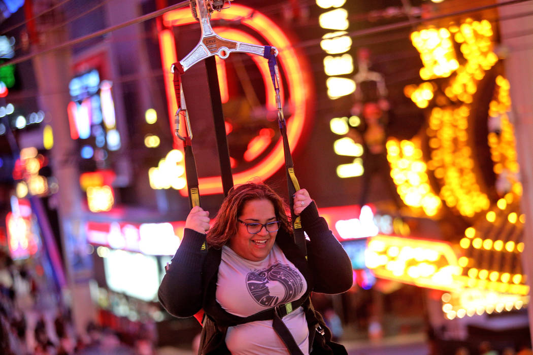 Maidelys Salas on the SlotZilla Zipline at the Fremont Street Experience in Las Vegas, Thursday, Nov. 1, 2018. Participants start near Las Vegas Boulevard, then fly over crowds and casinos to the ...