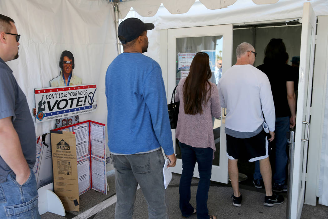 Early voters line up to cast their ballots at Silverado Ranch Plaza in Las Vegas Thursday, Nov. 1, 2018. The final day of early voting is Friday. Election day is Tuesday, Nov. 6. K.M. Cannon Las V ...