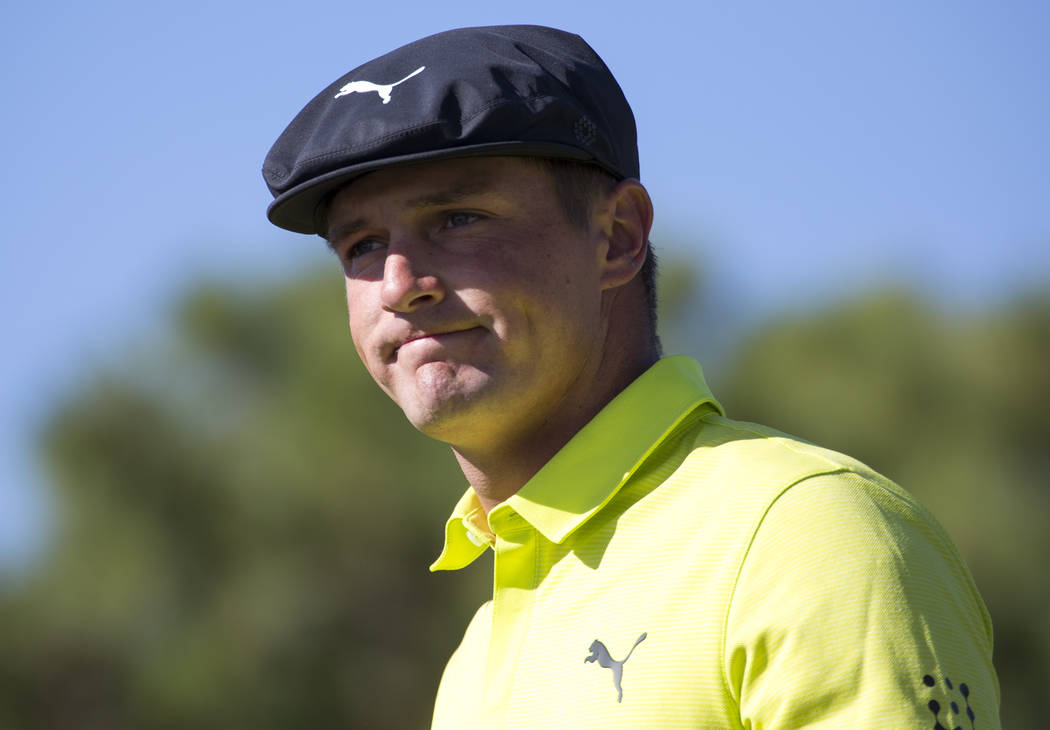 Bryson DeChambeau walks to the fairway after teeing off from the first box during the third round of the Shriners Hospitals for Children Open tournament at TPC at Summerlin in Las Vegas on Saturda ...