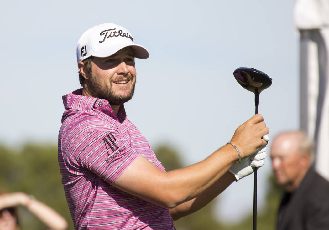 Peter Uihlein watches his ball after teeing off from the first box during the third round of the Shriners Hospitals for Children Open tournament at TPC at Summerlin in Las Vegas on Saturday, Nov. ...