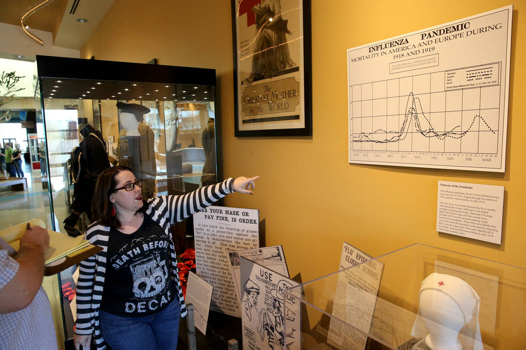 Nevada State Museum Administrative Assistant Ilana Short talks about a section of the new World War I exhibit dedicated to the 1918 worldwide flue pandemic in the museum at the Las Vegas Springs P ...