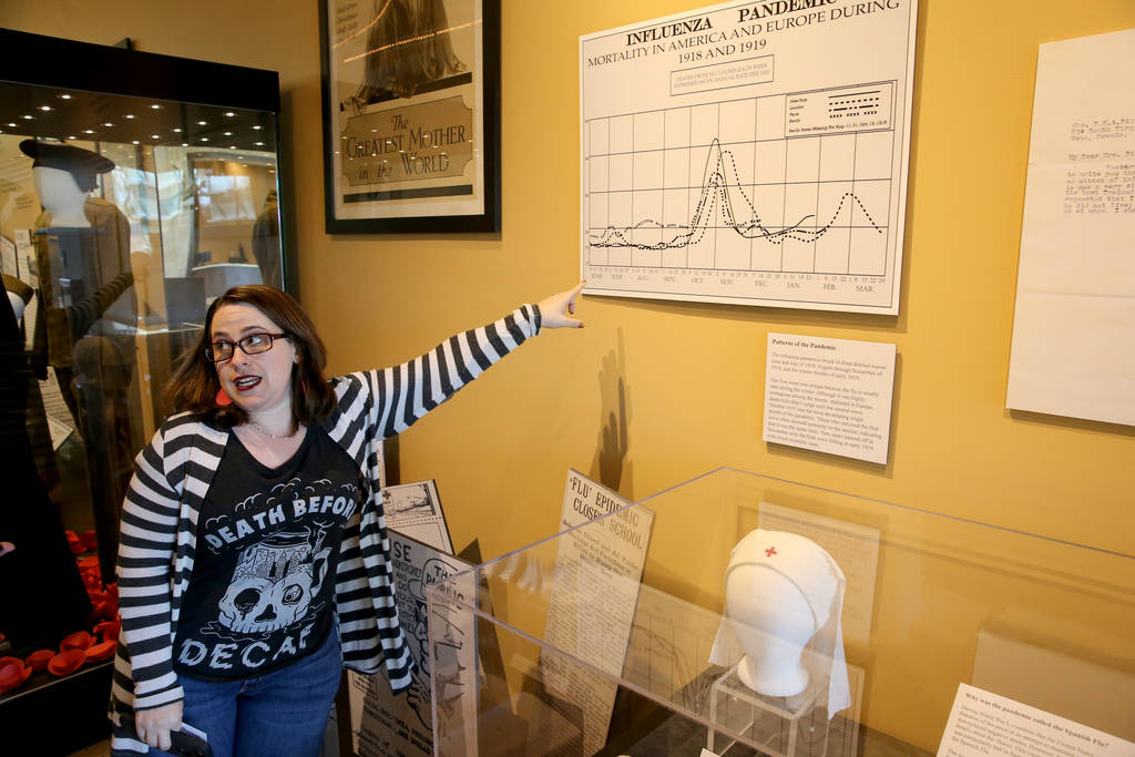 Nevada State Museum Administrative Assistant Ilana Short talks about a section of the new World War I exhibit dedicated to the 1918 worldwide flue pandemic in the museum at the Las Vegas Springs P ...