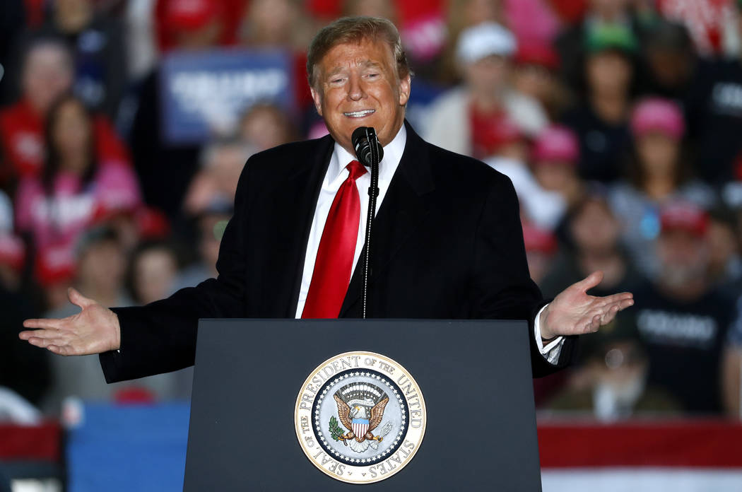 President Donald Trump speaks during a rally at Southern Illinois Airport in Murphysboro, Ill., Saturday, Oct. 27, 2018. Eager to focus voters on immigration in the lead-up to the midterm election ...