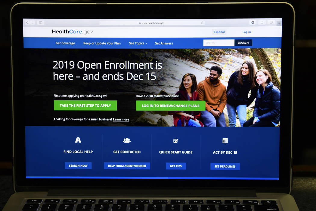 The federal website where consumers can sign up for health insurance under the Affordable Care Act is shown on a computer screen in Washington on Thursday. (AP Photo/Susan Walsh)
