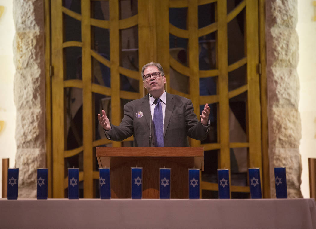 Rabbi Felipe Goodman speaks during a vigil on Thursday, November 1, 2018, at Temple Beth Sholom in Las Vegas for the 11 people killed at the Tree of Life synagogue in Pittsburgh, Pa., on Saturday. ...
