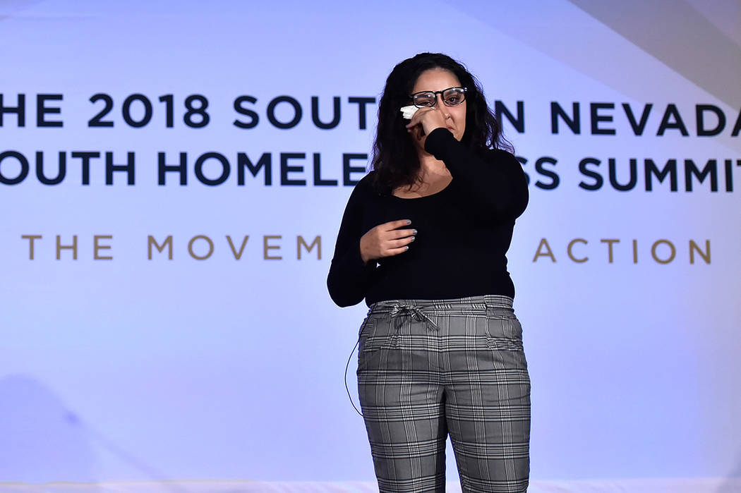 Dessirae Mitchell wipes a tear as she shares her story of homelessness during the Southern Nevada Youth Homelessness Summit at the Venetian Las Vegas Friday, Nov. 2, 2018, in Las Vegas. Nevada Par ...
