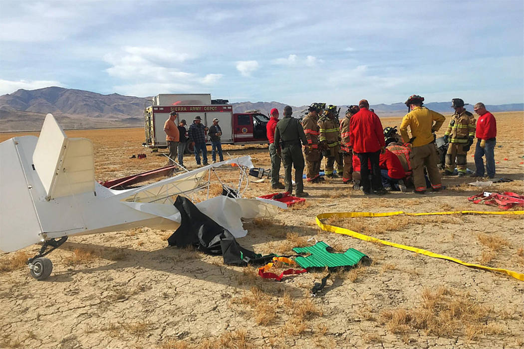 Crews work at the scene of a plane crash in the Fish Springs area, about 40 miles north of Reno, on Saturday, Nov. 3, 2018. (Washoe County Sheriff's Office)