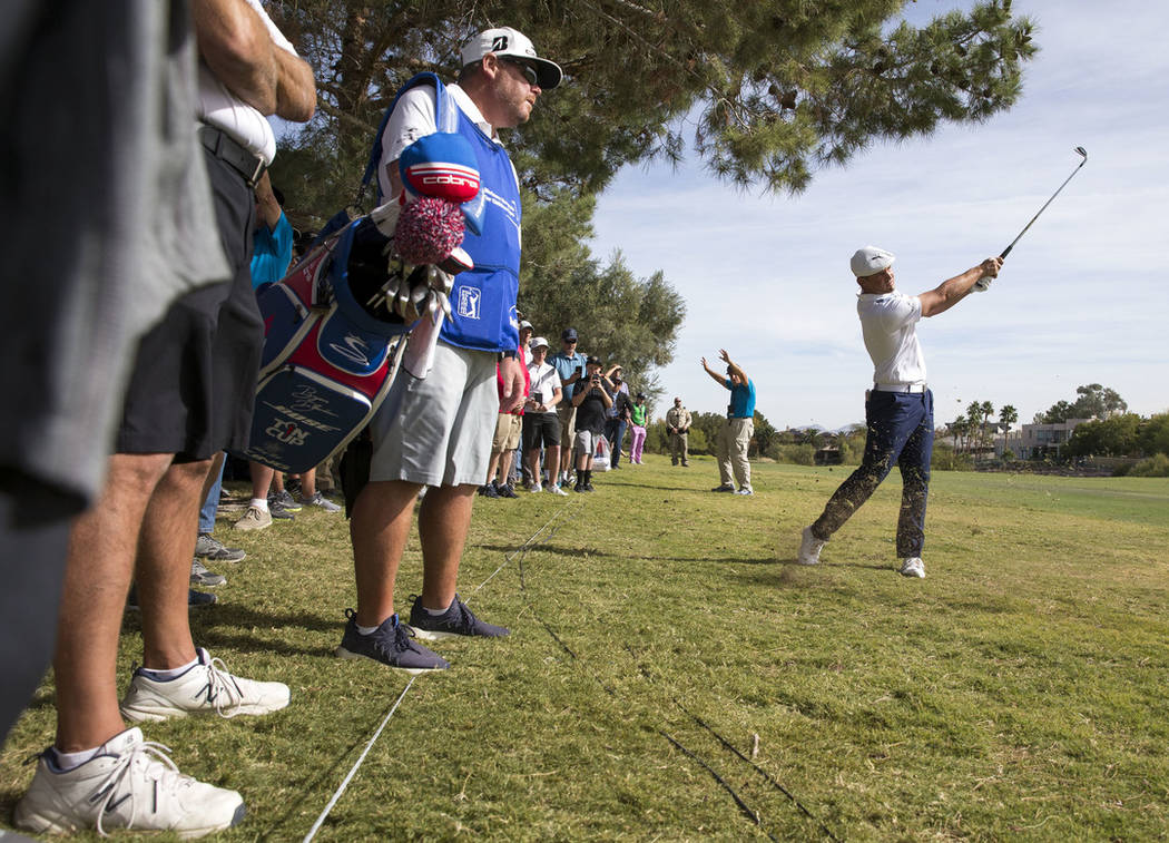 American golfer Bryson DeChambeau hits from the fairway on the third hole during the final round of the Shriners Hospitals for Children Open at TPC at Summerlin in Las Vegas on Sunday, Nov. 4, 201 ...