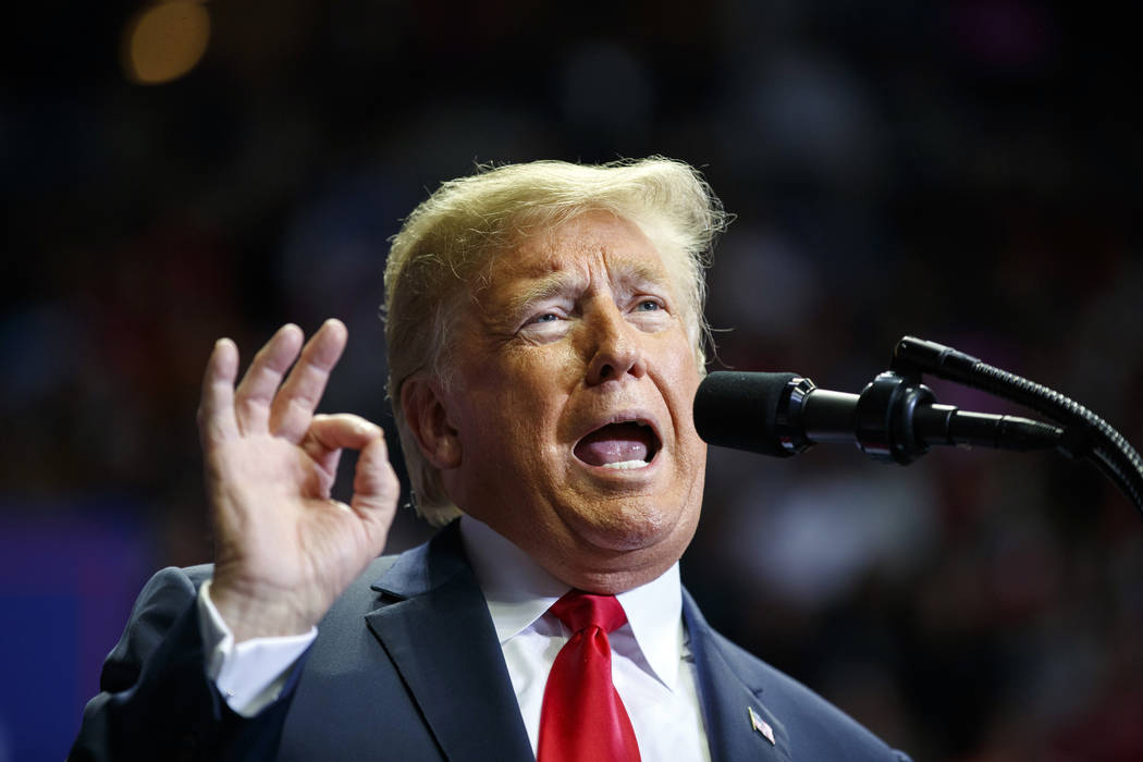 President Donald Trump speaks at a rally at Allen County War Memorial Coliseum, Monday, Nov. 5, 2018, in Fort Wayne, Ind. (AP Photo/Carolyn Kaster)