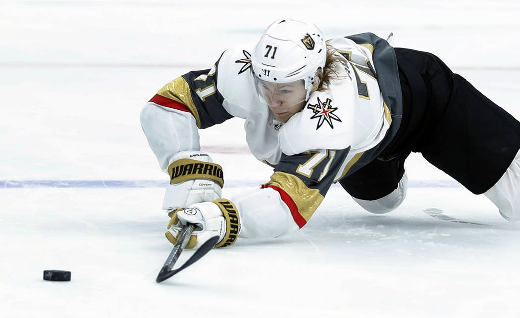Vegas Golden Knights' William Karlsson reaches for a loose puck during the first period of an NHL hockey game against the St. Louis Blues Thursday, Nov. 1, 2018, in St. Louis. (Jeff Roberson/AP)