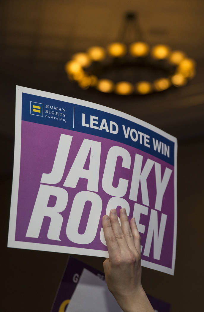 Supporters of congresswoman Jacky Rosen wave signs during an election night event hosted by the Nevada Democrats on Tuesday, November 6, 2018, at Caesars Palace, in Las Vegas. Benjamin Hager Las V ...