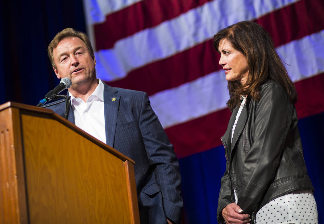 U.S. Sen. Dean Heller, R-Nev., speaks alongside his wife Lynne after conceding to challenger U.S. Rep. Jacky Rosen, D-Nev., during the Nevada Republican Party election night watch party at the Sou ...