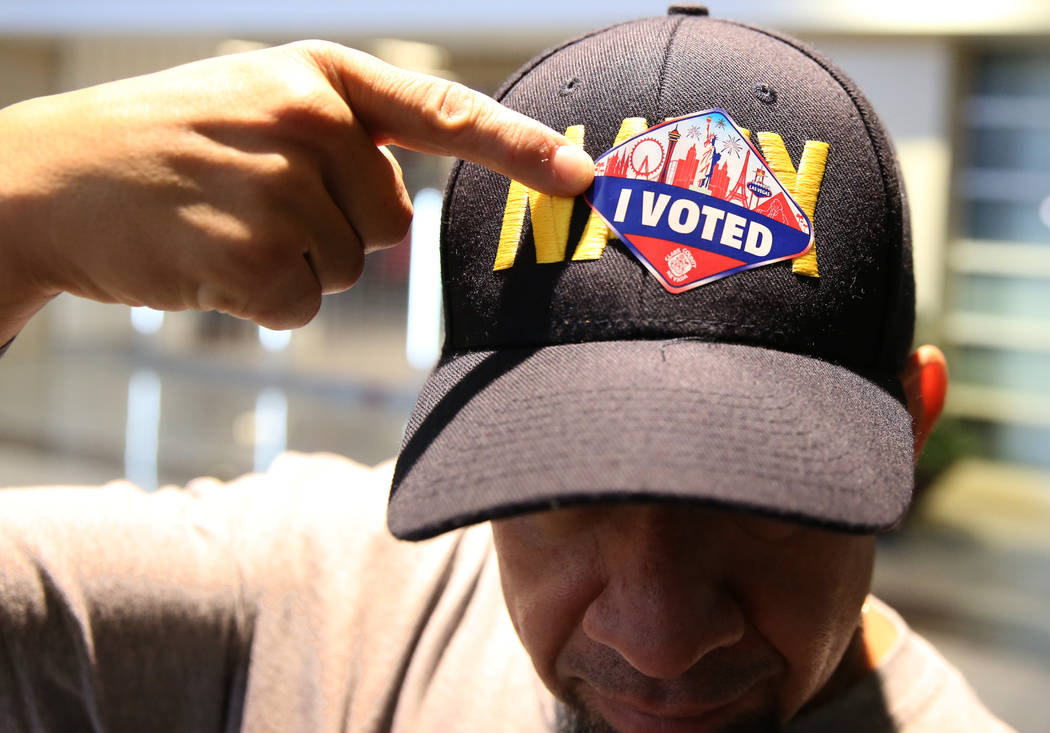 Luis Gonzalez shows off his "I Voted" sticker after casting his ballots at a polling station at Galleria Mall on Tuesday, Nov. 6, 2018, in Henderson. (Bizuayehu Tesfaye/Las Vegas Review- ...