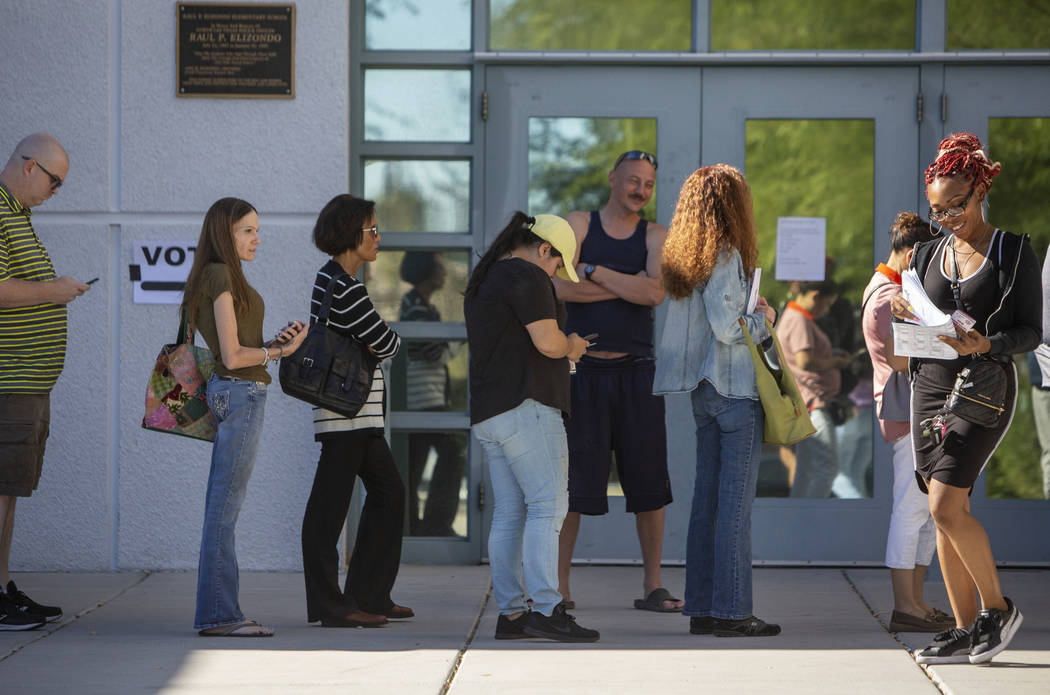 Voters stand in line to cast their ballots at a polling station at Raul Elizondo Elementary School in North Las Vegas, Tuesday, Nov. 6, 2018. Caroline Brehman/Las Vegas Review-Journal