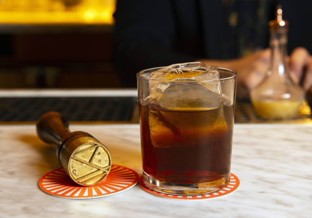 The "Detox-retox" cocktail is made up of blended scotch, Venezuelan rum, pineapple rum, aged cachaca, coconut water, angostura fee, and absinthe at the NoMad Bar and Restaurant in Park MGM in Las ...
