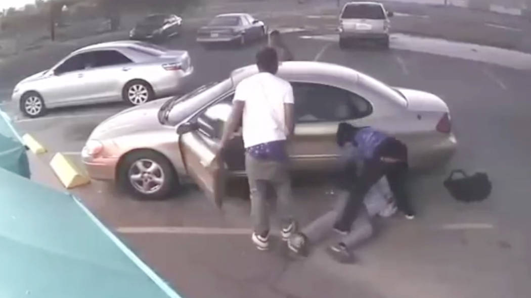 Las Vegas police are looking for 3 suspects who beat a 78-year-old man and took his vehicle Tuesday evening near downtown Las Vegas. (LVMPD)