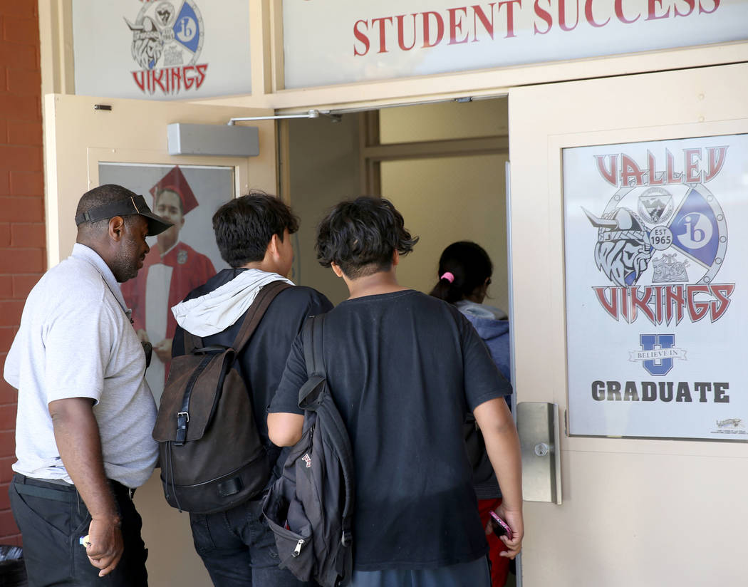 Clark County School District Attendance Officer Tony Stark returns unidentified truant students to Valley High School in Las Vegas Monday, Oct. 17, 2018. K.M. Cannon Las Vegas Review-Journal @KMCa ...