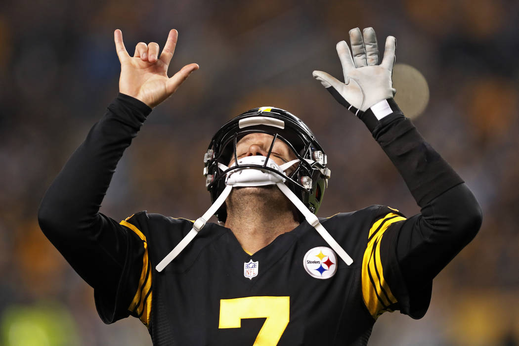 Pittsburgh Steelers quarterback Ben Roethlisberger (7) celebrates a touchdown pass to Antonio Brown during the first half of an NFL football game against the Carolina Panthers in Pittsburgh, Thurs ...