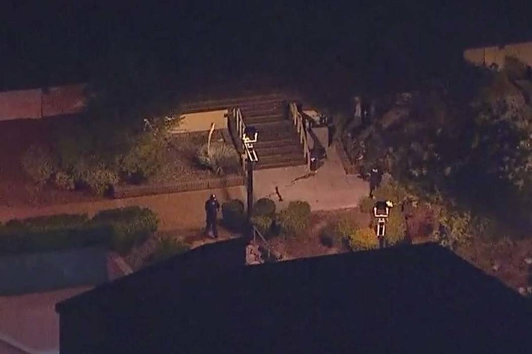 In this image made from aerial video, police move through the vicinity of a shooting in Thousand Oaks, California, early Thursday, Nov. 8, 2018. (KABC via AP)