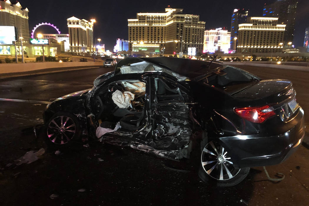 The driver of a Chrysler 200 sedan was killed Wednesday night and three others were injured in a crash on Flamingo Road near Interstate 15. (Nevada Highway Patrol)