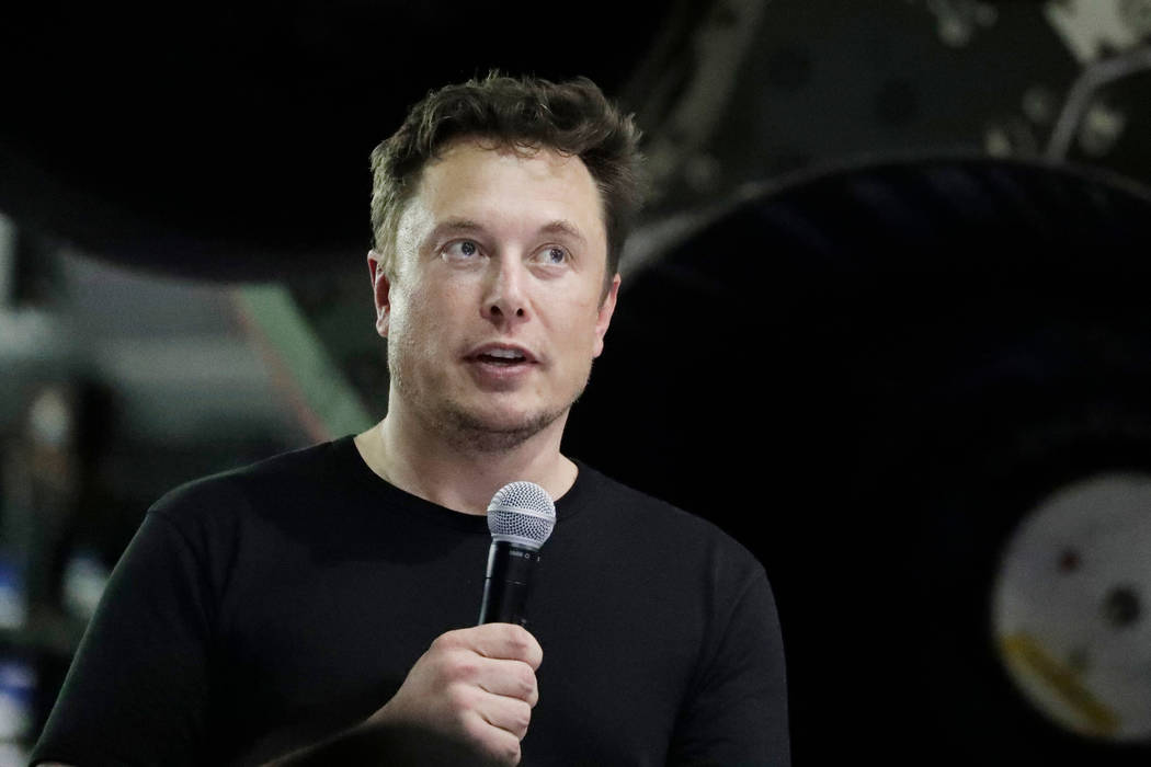 Elon Musk speaks after announcing Japanese billionaire Yusaku Maezawa as the first private passenger on a trip around the moon in Hawthorne, Calif., Sept. 17, 2018 (AP Photo/Chris Carlson)