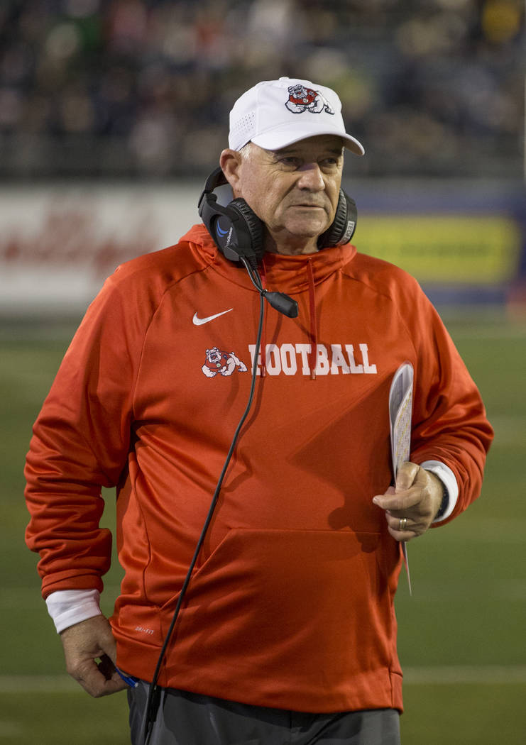 Fresno State head coach Jeff Tedford works the sidelines against Nevada in the second half of an NCAA college football game in Reno, Nev., Friday, Oct, 6, 2018. (AP Photo/Tom R. Smedes)