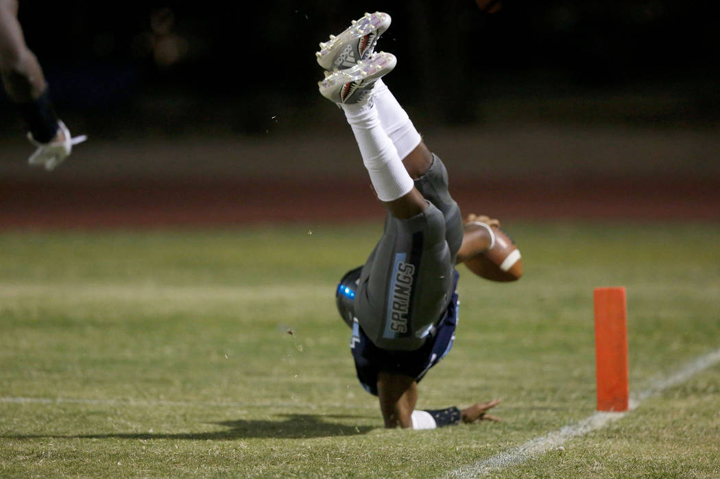 Canyon Springs' Xavier Delong scores a touchdown against Green Valley High School in the second half of a football game at Canyon Springs High School in North Las Vegas, Friday, Sept. 7, 2018. Chi ...