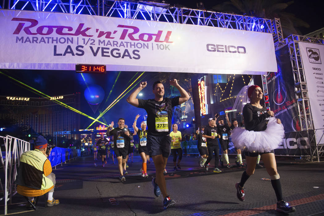 Participants cross the finish line during the Rock 'n' Roll Las Vegas Marathon on Nov. 12. (Sam Morris Las Vegas News Bureau)