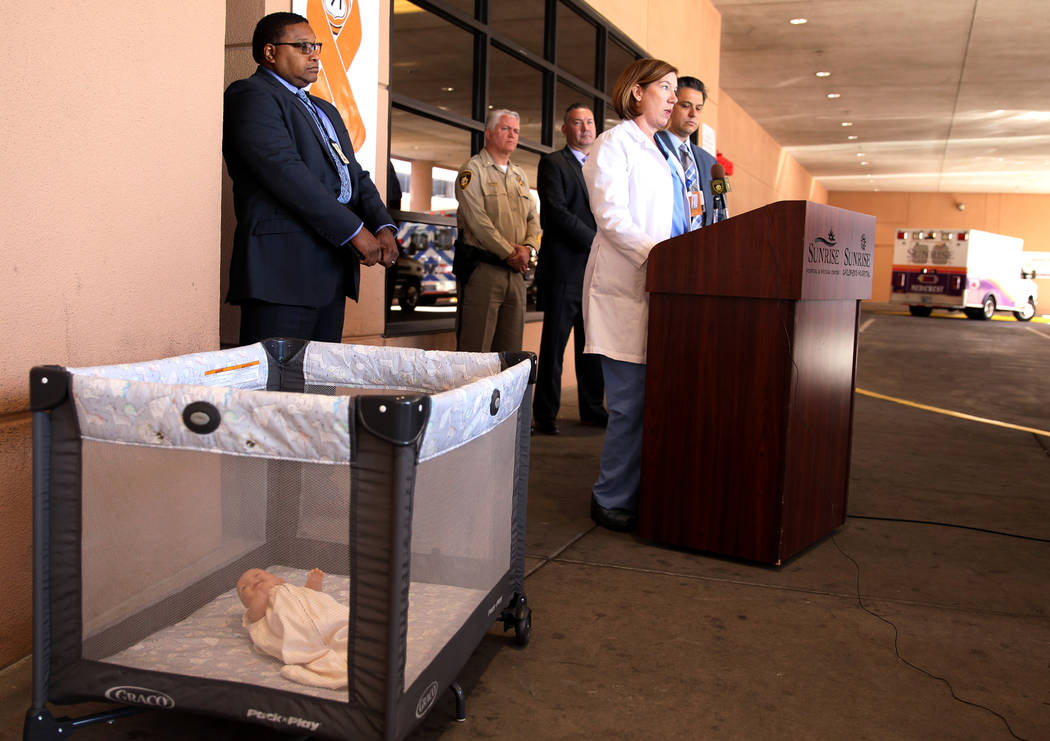 Dr. Kelly Kogut, medical director of children's surgery at Sunrise Children's Hospital, talks about proper sleeping technique for babies during a news conference at Sunrise Children's Hospital Thu ...