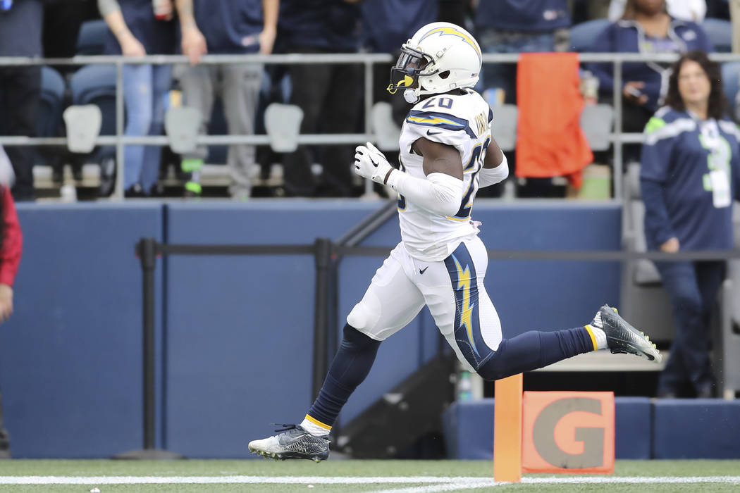 Los Angeles Chargers defensive back Desmond King (20) crosses the goalie with a pick six in the second half of an NFL football game, Sunday, Oct. 28, 2018, in Los Angeles. (AP Photo/Peter Joneleit)