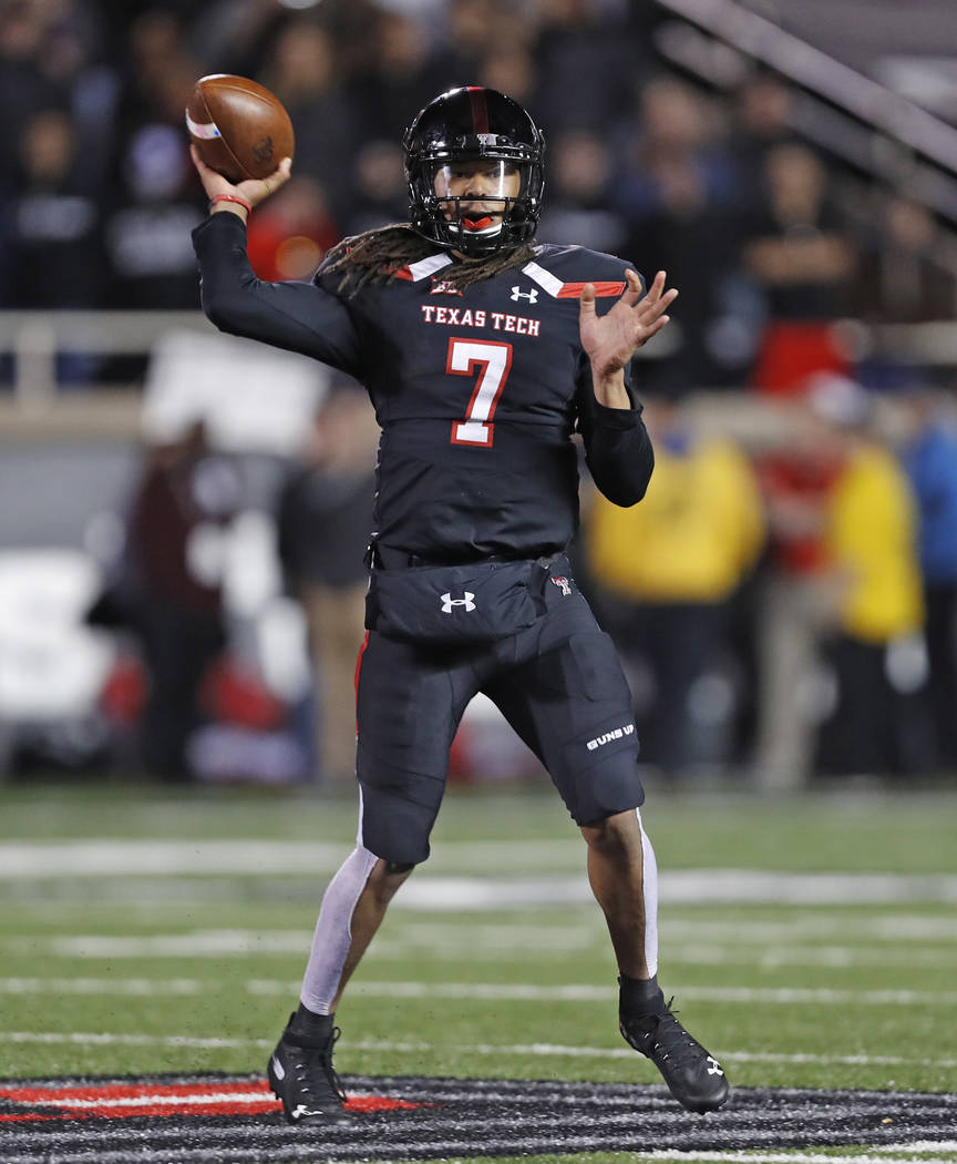 Texas Tech's Jett Duffey throws a pass during the second half of the team's NCAA college football game against Oklahoma, Saturday, Nov. 3, 2018, in Lubbock, Texas. (AP Photo/Brad Tollefson)