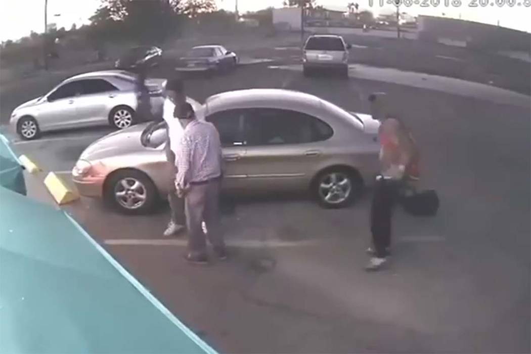 In an image taken from video, three males approach an elderly man in the 2500 block of Fremont Street on Tuesday, Nov. 6, 2018, beating him and stealing his car and other items. (Las Vegas Metropo ...
