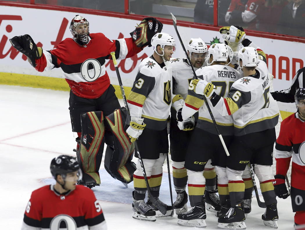 Ottawa Senators goaltender Craig Anderson (41) reacts as he claims goaltender interference after Vegas Golden Knights center Pierre-Edouard Bellemare (41) during the third period of an NHL hockey ...