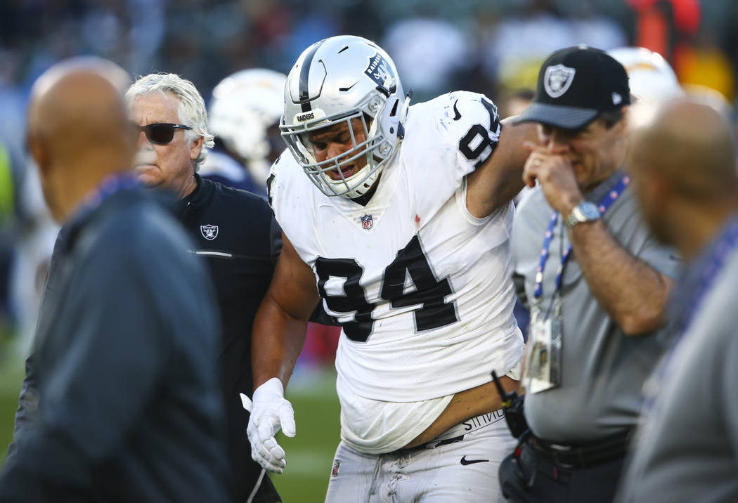 Oakland Raiders defensive tackle Eddie Vanderdoes (94) walks off the field after a torn ACL during an NFL game against the Los Angeles Chargers at StubHub Center in Carson, Calif. on Sunday, Dec. ...