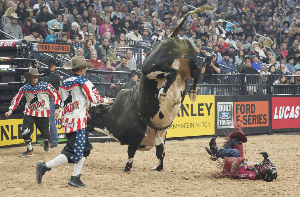 Brennon Eldred gets bucked off of "Hydrastar Slinger Jr." during the Professional Bull Riders World Finals on Thursday, November 8, 2018, at T-Mobile Arena, in Las Vegas. Benjamin Hager ...