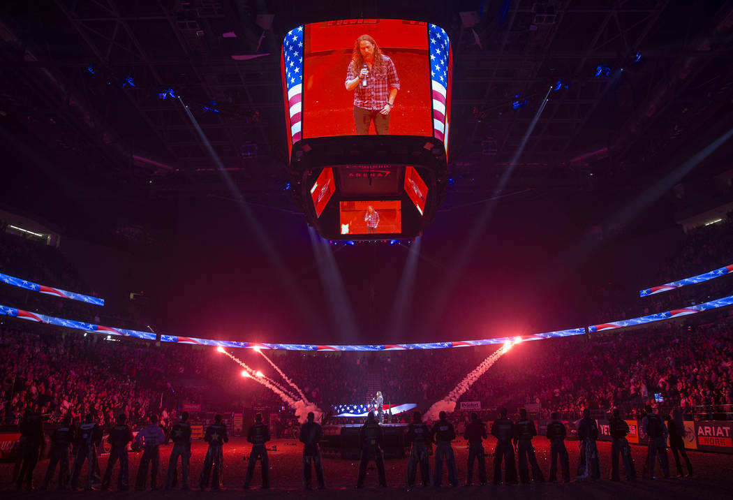 Christopher Shayne sings the national anthem before the start of the Professional Bull Riders World Finals on Thursday, November 8, 2018, at T-Mobile Arena, in Las Vegas. Benjamin Hager Las Vegas ...