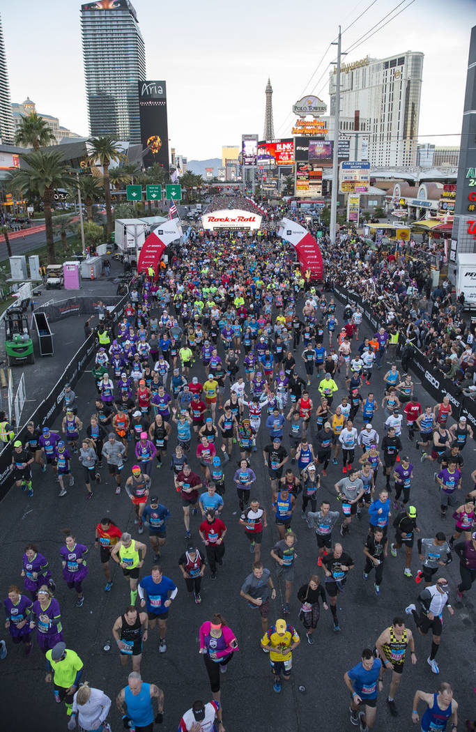 Runners leave the starting line during the 2018 Rock 'n' Roll Marathon on the Strip in Las Vegas on Sunday, Nov. 11, 2018. Richard Brian Las Vegas Review-Journal @vegasphotograph