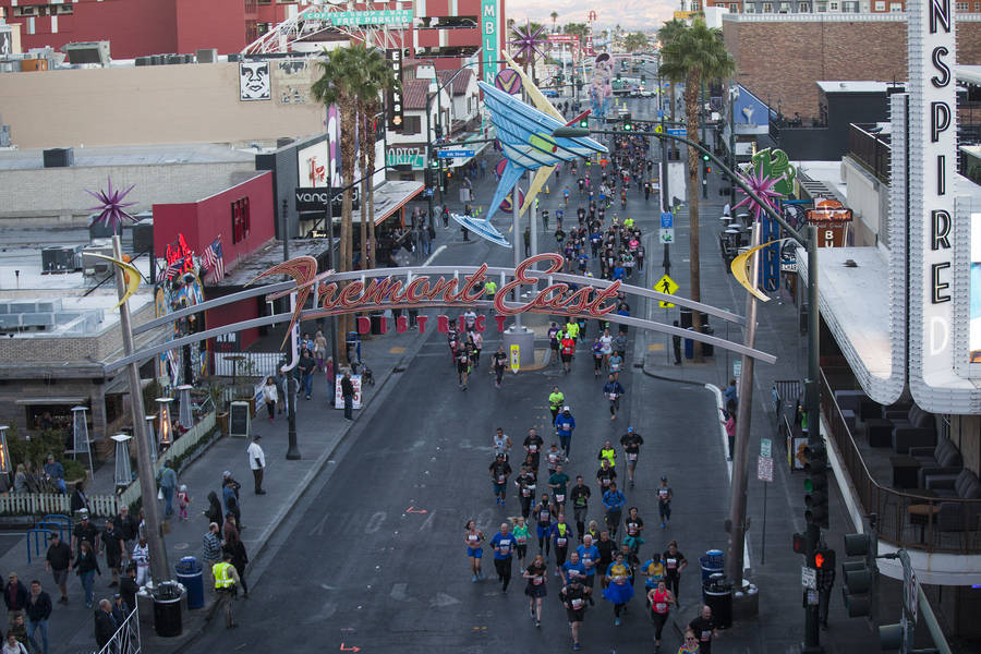 Runners in the 10k race make their way down Fremont Street for the Rock 'n' Roll Marathon in Las Vegas, Sunday, Nov. 11, 2018. Rachel Aston Las Vegas Review-Journal @rookie__rae