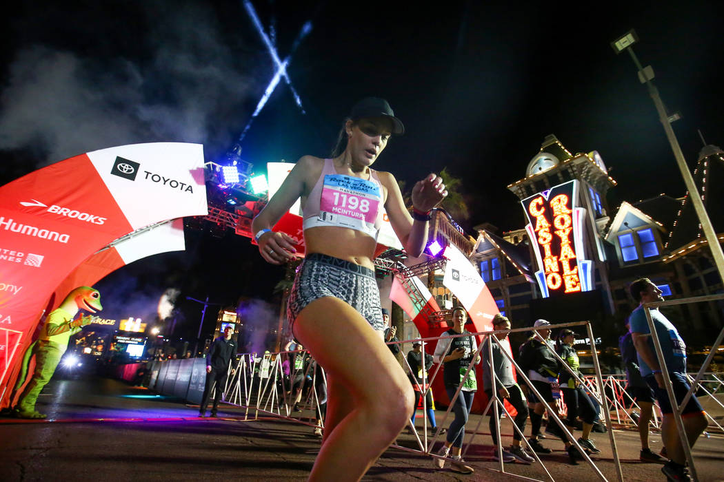 First place women's finisher Hannah McInturff crosses the finish line during the 2018 Rock 'n' Roll Marathon on the Strip in Las Vegas, Sunday,Nov. 11, 2018. Caroline Brehman/Las Vegas Review-Journal