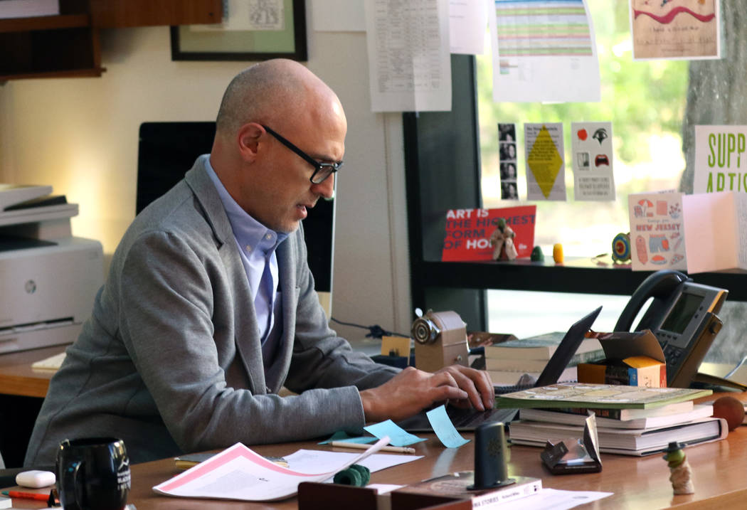Joshua Wolf Shenk, artistic and executive director of the Beverly Rogers, Carol C. Harter Black Mountain Institute at UNLV, works at his office on Wednesday Nov. 7, 2018, in Las Vegas. (Bizuayehu ...