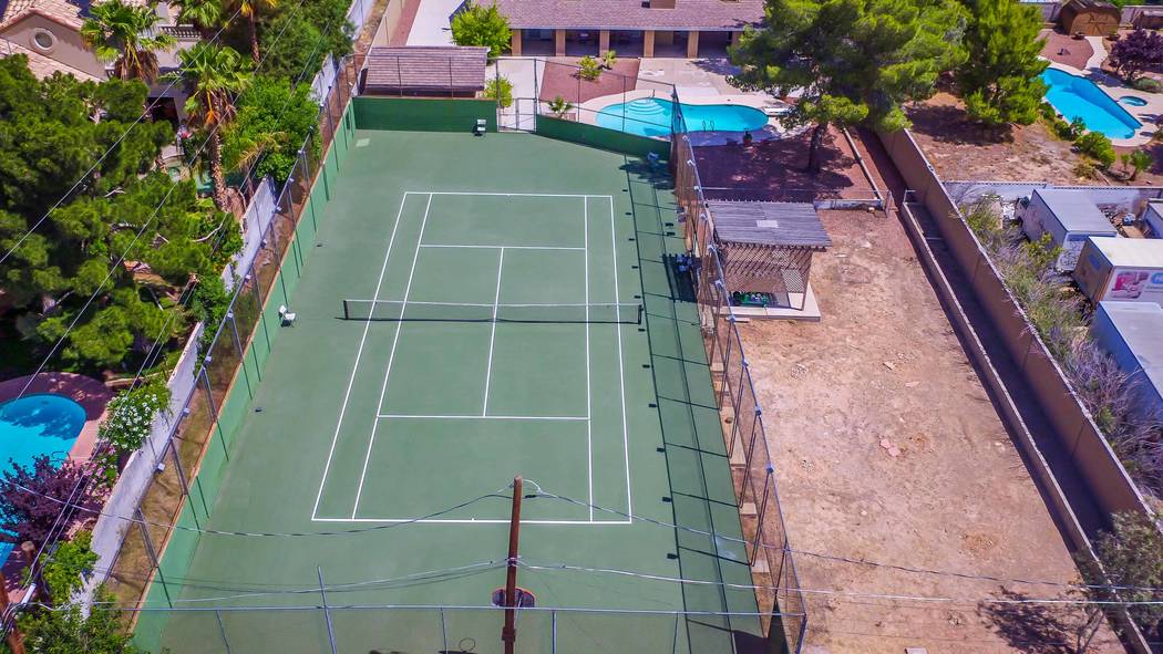 Of course, the childhood home of Andre Agassi has a regulation-sized tennis court. (Xpand Realty)
