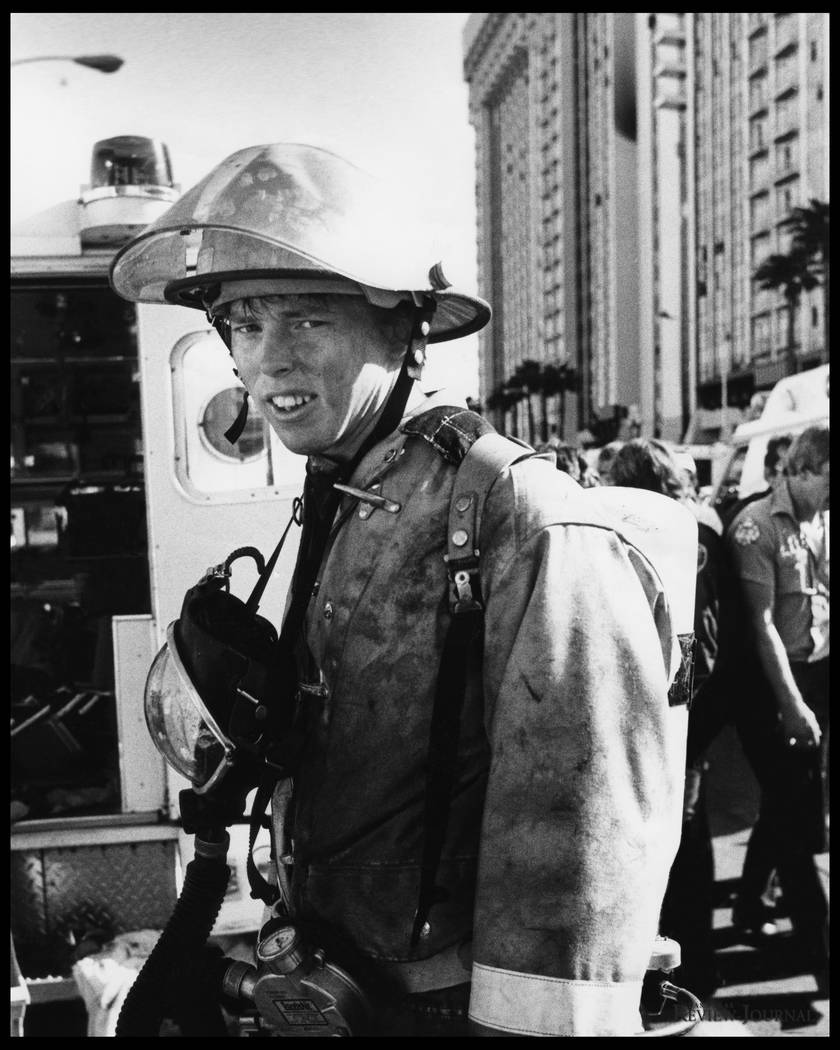 An unidentified Clark County Firefighter is pictured at the November 21, 1980 MGM Grand Hotel fire. Over 200 firefighters responded to the blaze. Initial responders arrived on scene to find hotel ...