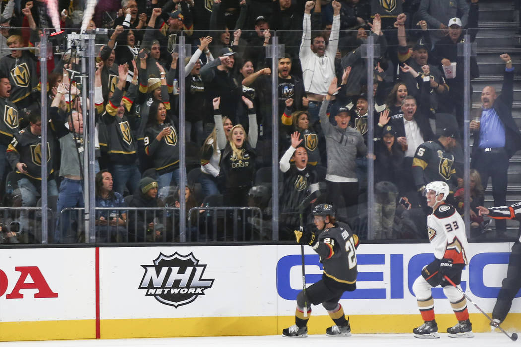Golden Knights fans celebrate a goal by Golden Knights center Cody Eakin (21) during the second period of an NHL hockey game against the Anaheim Ducks at T-Mobile Arena in Las Vegas on Wednesday, ...