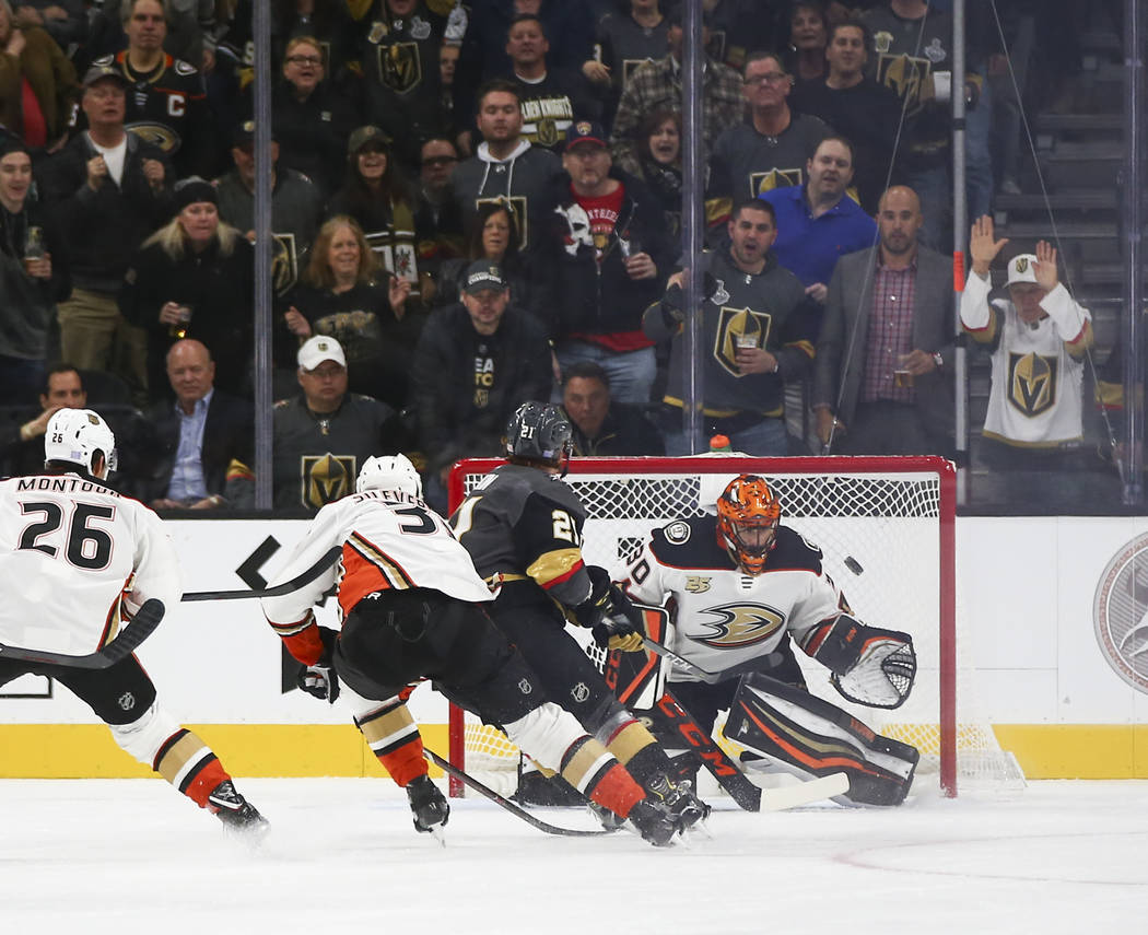 Golden Knights center Cody Eakin (21) scores his second goal past Anaheim Ducks goaltender Ryan Miller (30) during the second period of an NHL hockey game at T-Mobile Arena in Las Vegas on Wednesd ...