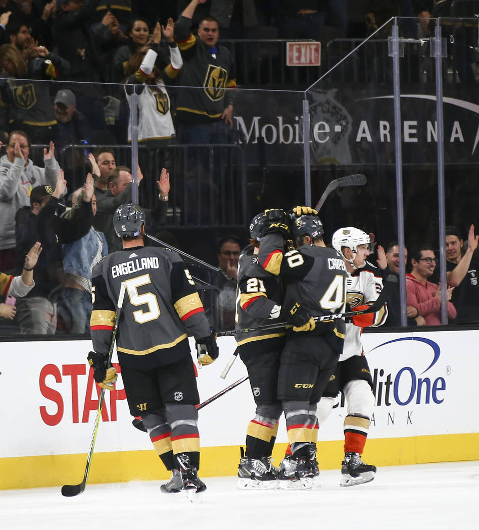 Golden Knights center Cody Eakin (21) celebrates his goal with teammate Ryan Carpenter (40) during the second period of an NHL hockey game against the Anaheim Ducks at T-Mobile Arena in Las Vegas ...