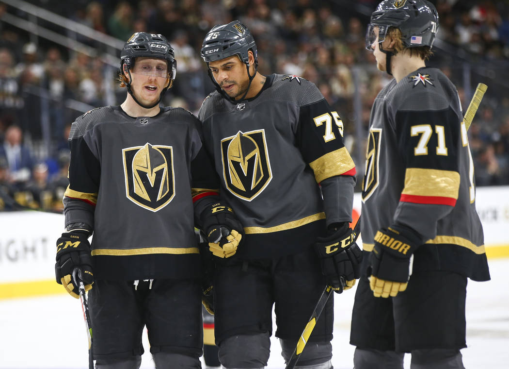 Golden Knights center Cody Eakin (21) talks with Golden Knights right wing Ryan Reaves (75) during the third period of an NHL hockey game against the Anaheim Ducks at T-Mobile Arena in Las Vegas o ...