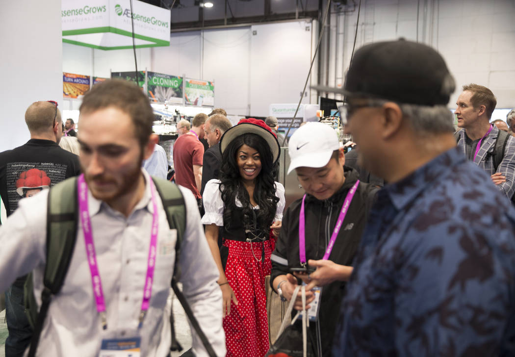 Huber saleswoman Chupy Macias, middle, talks with customers during MJBizCon on Wednesday, November 14, 2018, at the Las Vegas Convention Center, in Las Vegas. Benjamin Hager Las Vegas Review-Journal