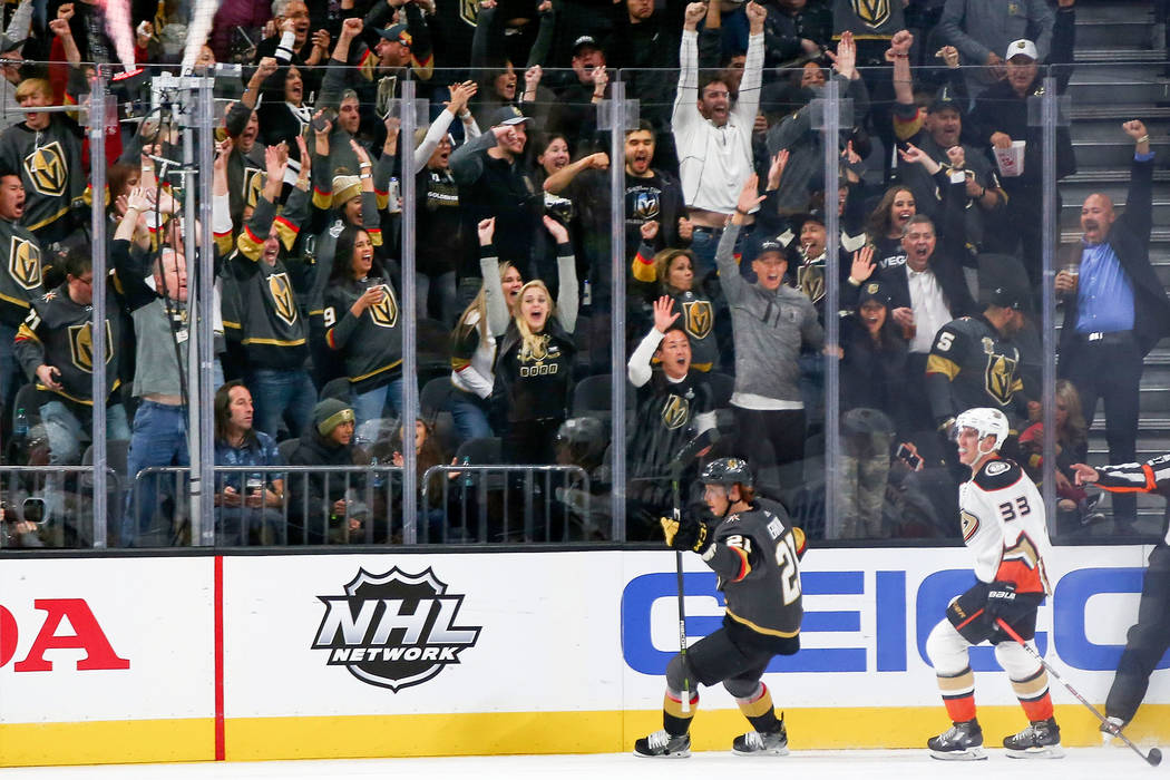 Golden Knights fans celebrate a goal by Golden Knights center Cody Eakin (21) during the second period of an NHL hockey game against the Anaheim Ducks at T-Mobile Arena in Las Vegas on Wednesday, ...