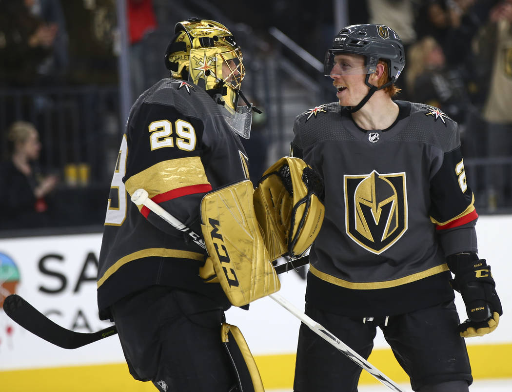 Golden Knights goaltender Marc-Andre Fleury (29) celebrates a goal by Golden Knights center Cody Eakin during the second period of an NHL hockey game against the Anaheim Ducks at T-Mobile Arena in ...